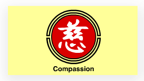A red and white symbol with the word compassion underneath it.
